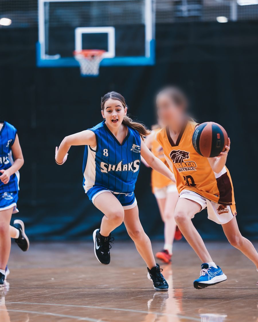 A Scarborough Sharks junior driving to the basket
